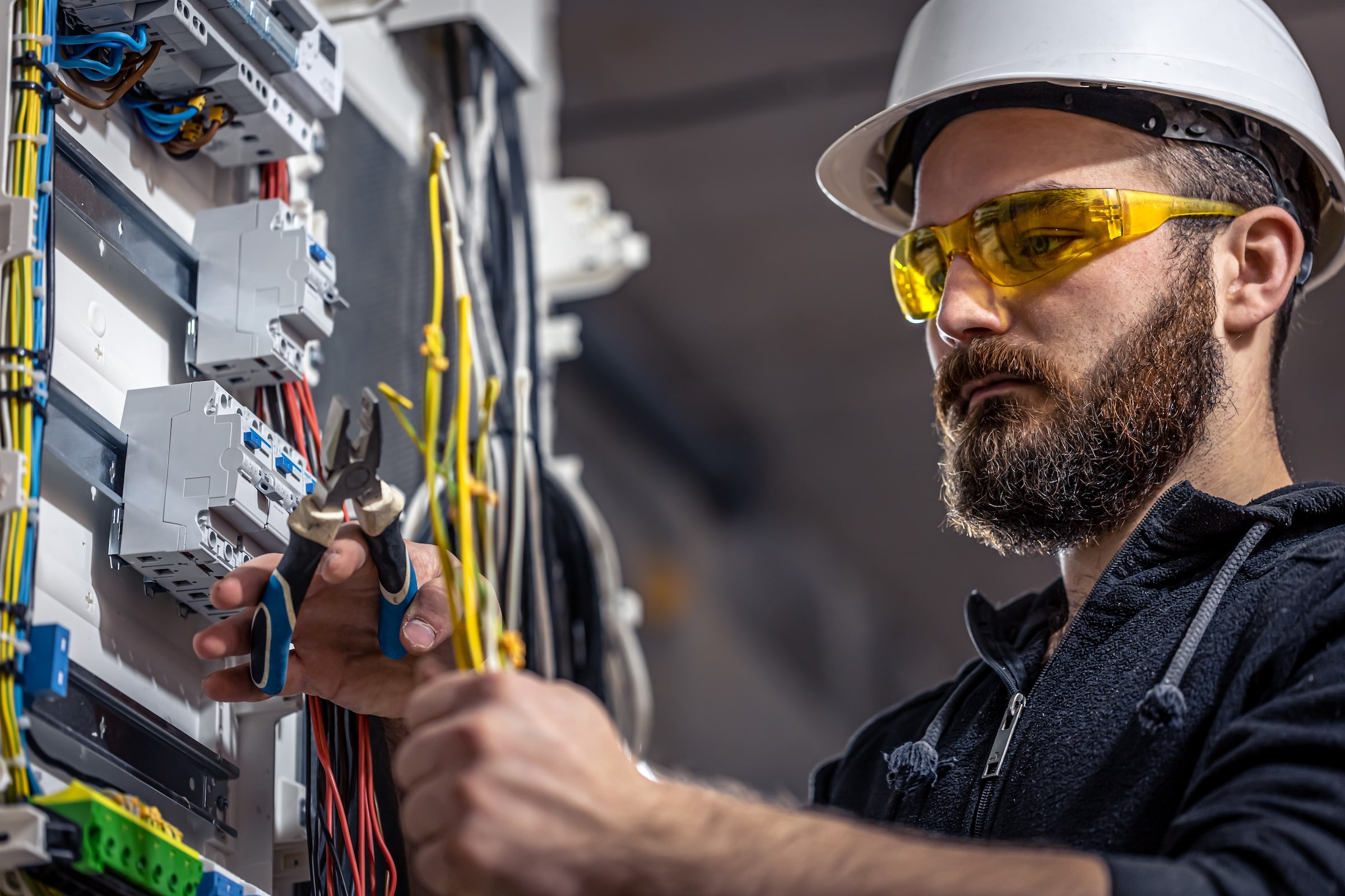 Man working on electrical components